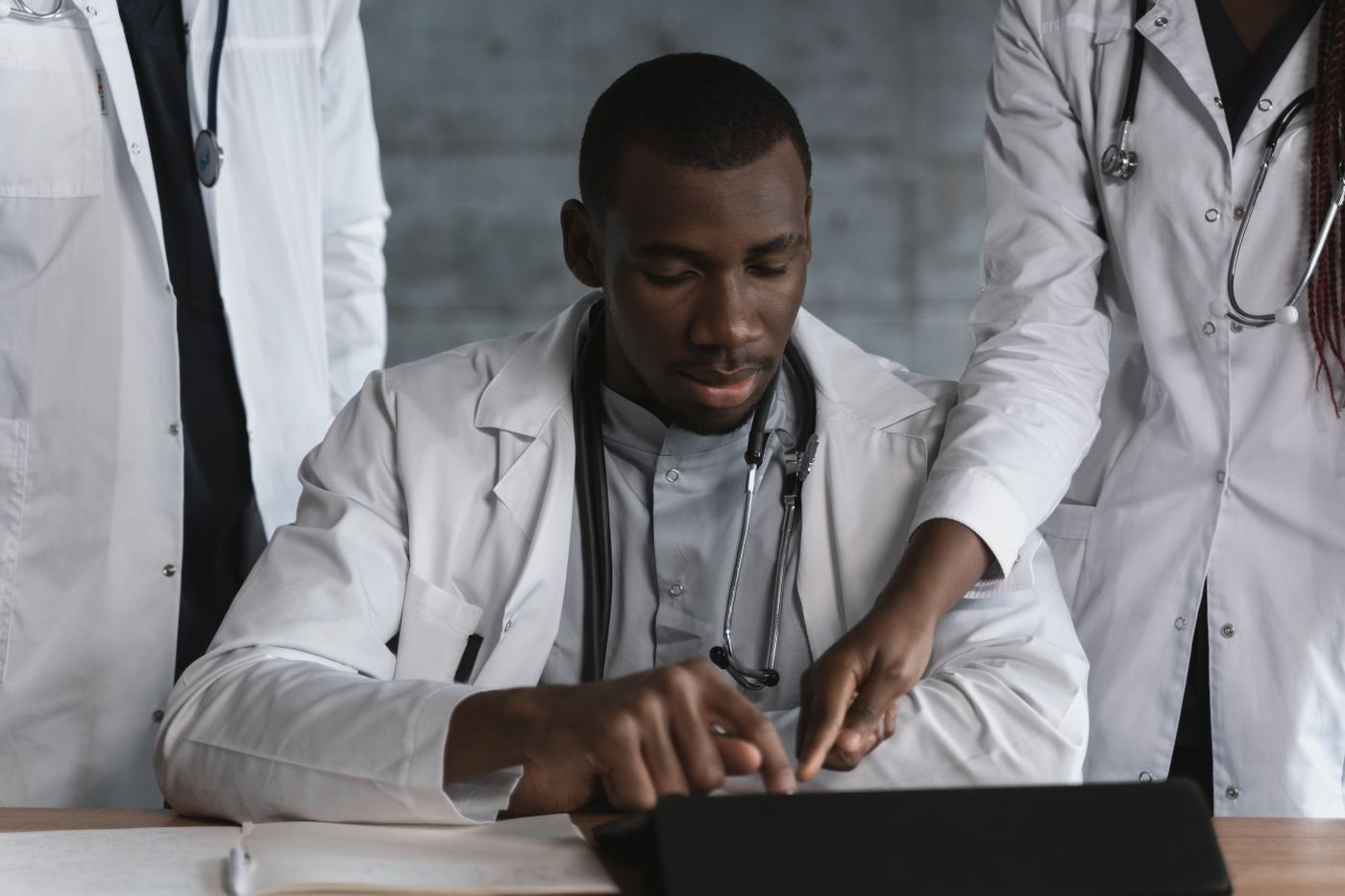 Healthcare professionals reviewing information together